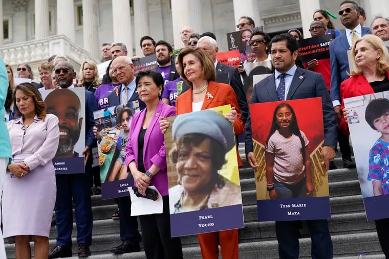 From left, Rep. Veronica Escobar, D-Texas, Rep. Judy Chu, D-Calif., House Speaker Nancy Pelosi of Calif., Rep. Jimmy Gomez, D-Calif., and Rep. Carolyn Maloney, D-N.Y., attend an event on the steps of the U.S. Capitol about gun violence on Friday.