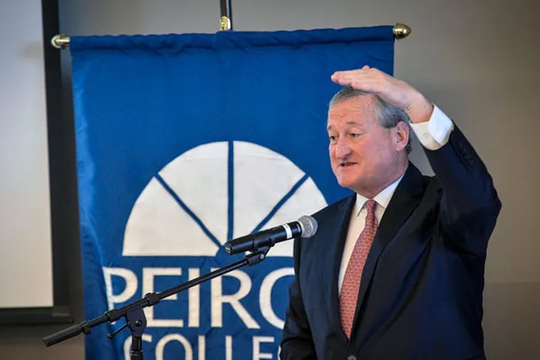 Democratic mayoral nominee Jim Kenney speaks at Peirce College, where he received the Peirce College Thomas May Peirce Leadership Award on Tuesday. The college specializes in providing an education to working adults. (CHARLES MOSTOLLER/For The Inquirer)