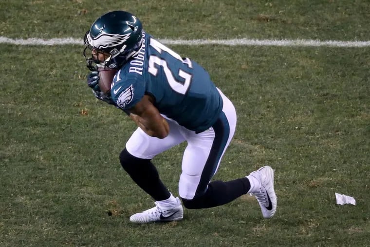 Eagles cornerback Patrick Robinson (21) intercepts a pass and runs it back for a touchdown during the first quarter of the NFC Championship game at Lincoln Financial Field on Sunday.