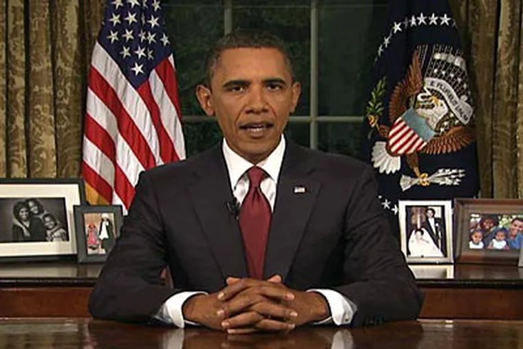 In this image from video, President Barack Obama speaks from the Oval Office at the White House on Tuesday about the end of the U.S. combat role in Iraq. (AP Photo/APTN)