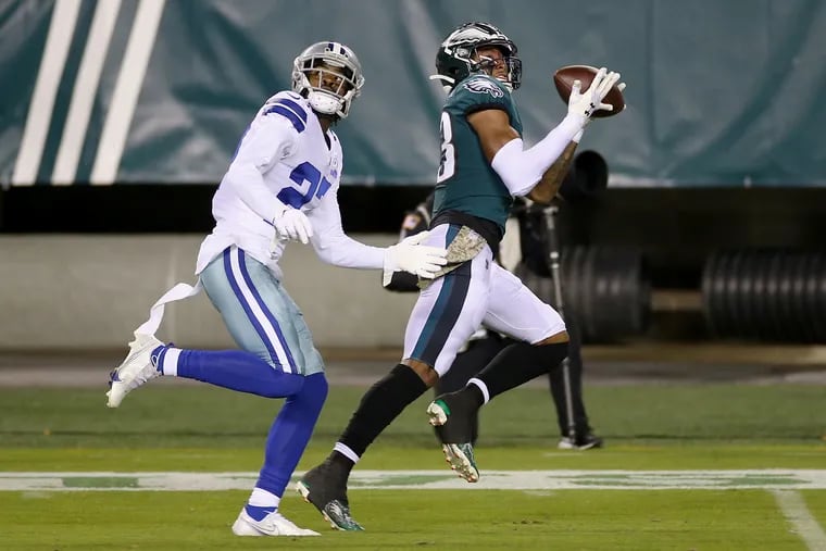 Eagles wide receiver Travis Fulgham (right) has caught just four passes in his last five games and played just 11 snaps Sunday.