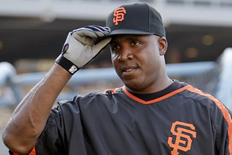 Could Barry Bonds have the same success as fellow disgraced slugger Mark McGwire has had as a hitting coach? (Associated Press)