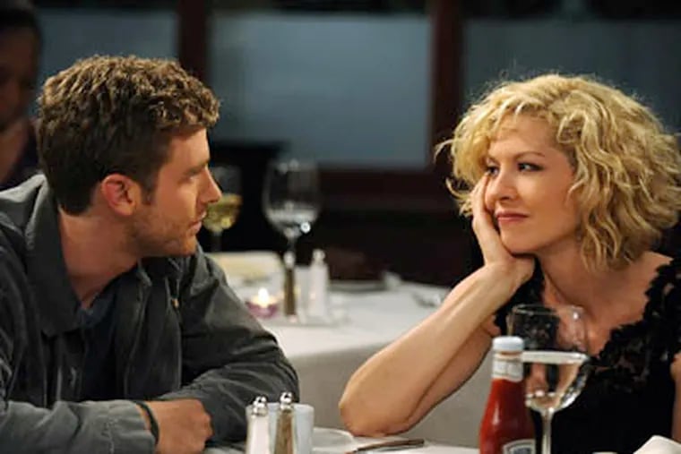 Jenna Elfman (right) is the older woman who is pregnant with the child of younger man Jon Foster (left) on "Accidentally."