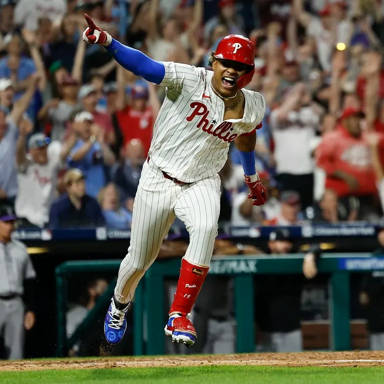Phillies Cristian Pache celebrates after hitting the game winning extra inning single.