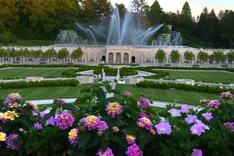 Flowers and fountains at Longwood Gardens in Kennett Square at dusk on Tuesday May 16,2017.