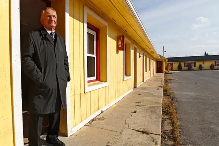 Egg Harbor Township Mayor Sonny McCollough stands in an open room door in the abandoned Golden Key Motel on Black Horse Pike in West Atlantic City. The notorious murders of four prostitutes whose bodies were dumped behind an equally notorious motels remains unsolved seven years later. Egg Harbor Township plans to buy up the motels, whose owners finally agreed to sell after their properties were damaged in Hurricane Sandy. (MICHAEL BRYANT/Staff Photographer)