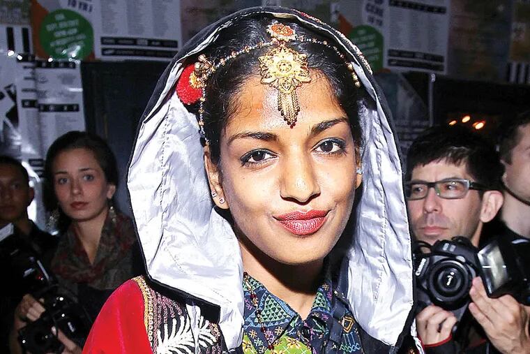 M.I.A is seen at the Opening Ceremony 10 Year Party on Sunday, Sept. 9, 2012 in New York. (Photo by Donald Traill/Invision/AP Images)