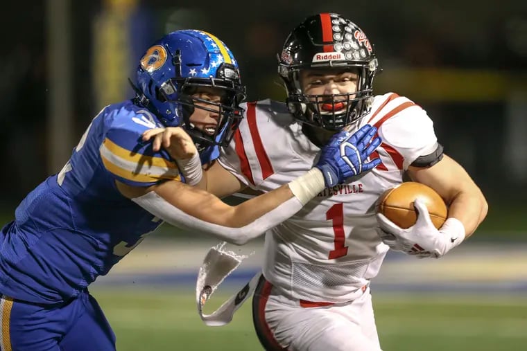 Coatesville's quarterback Ricky Ortega (right) and Downingtown West's Will Mahmud during the District 1 Class 6A championship game on Nov. 22, 2019. Both schools are members of the Ches-Mont League, which voted Friday to shut down fall sports because of the coronavirus outbreak.