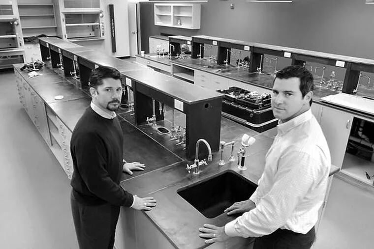 Business partners Robert Loughery (left) and Gregory Ventresca in a lab renovated for Bucks County Community College, one of two tenants for the old Rohm & Haas complex.