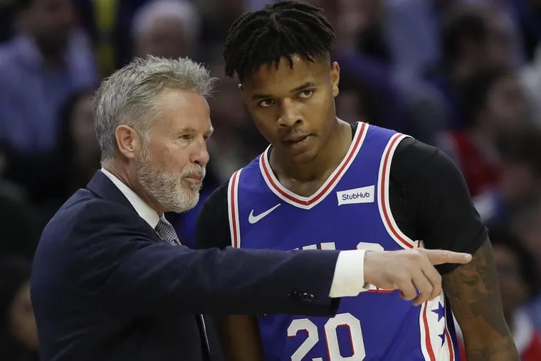 Sixers guard Markelle Fultz listens to Head Coach Brett Brown against the Chicago Bulls during the first-quarter on Thursday, October 18, 2018 in Philadelphia.