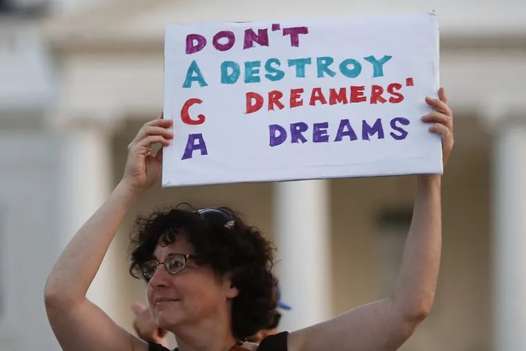 Julia Paley, of Arlington, Va., with the DMV Sanctuary Congregation Network, holds up a sign that reads “DACA Don’t Destroy Dreamers Dreams” during a rally supporting Deferred Action for Childhood Arrivals, or DACA, outside the White House, in Washington on Labor Day. The plan  for young immigrants brought to the country illegally as children will be phased out the Trump administration announced   Tuesday despite the fact that it was embraced by some top Republicans on Monday.  Others have denounced DACA as the beginning of a “civil war” within the party.