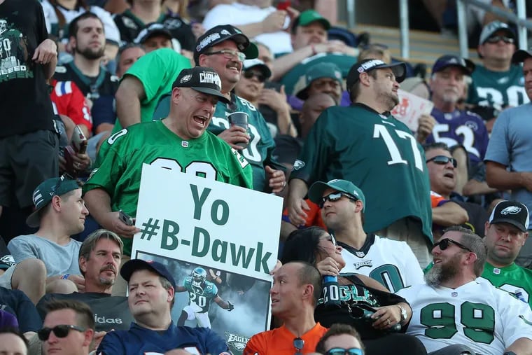 Eagles' fans in Canton celebrate Brian Dawkins' induction to the Pro Football Hall of Fame.