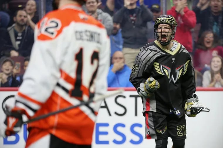The Wings' Steph Charbonneau (21) celebrating a goal against the Buffalo Bandits during the Wings' inaugural game since returning to Philadelphia, on Dec. 15.