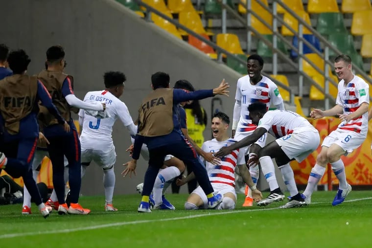Sebastian Soto (9) celebrates with teammates after scoring his second goal for the United States against Nigeria at the under-20 World Cup.