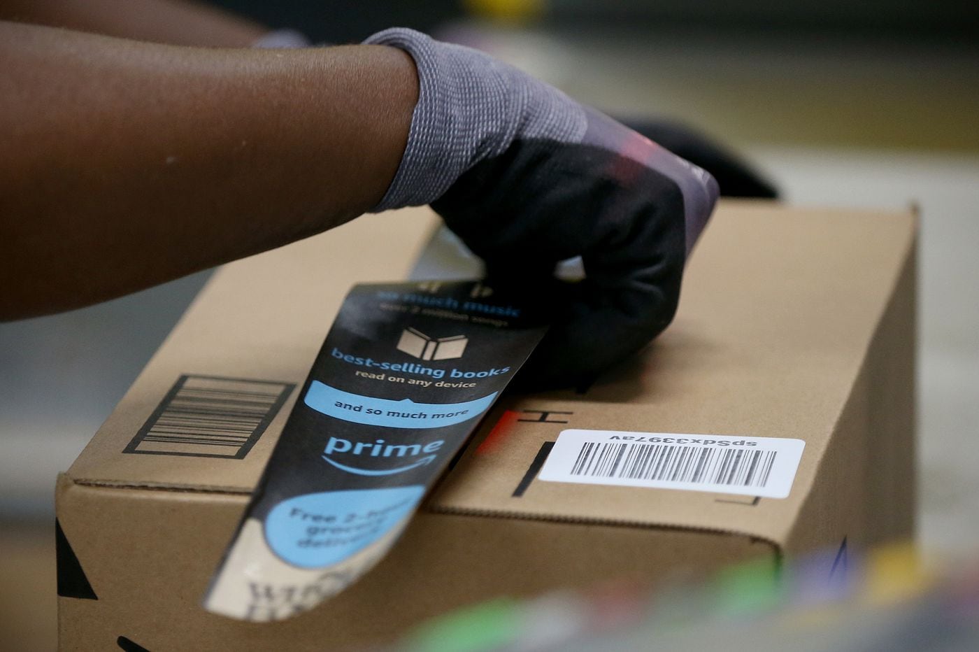 Should Amazon pay warehouse workers while they wait for