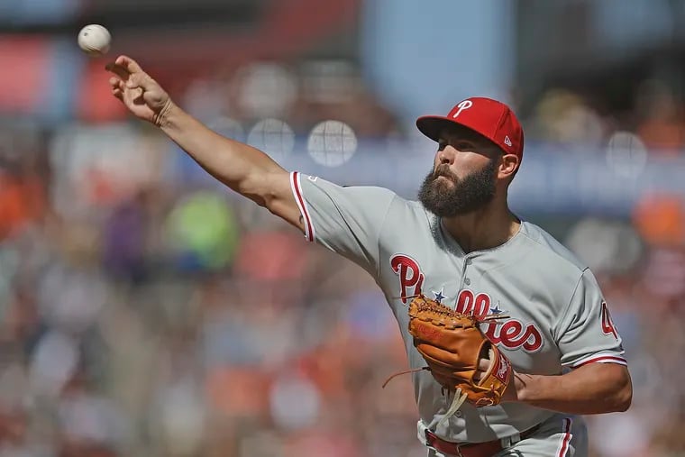 Jake Arrieta has been pitching with a bone spur in his throwing arm.