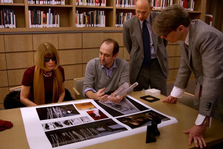 Anna Wintour (second from left) and  Andrew Bolton (right) in a meeting in    "The First Monday in May."