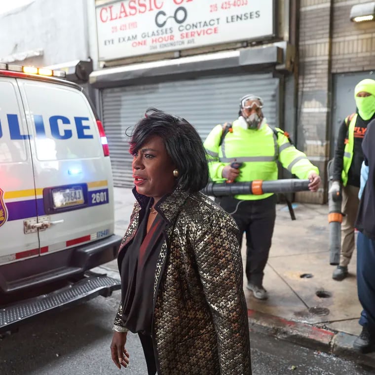 Philadelphia Mayor Cherelle L. Parker walks along Kensington Avenue on Thursday after taking the El to Kensington to attend an event marking her 100th day in office.
