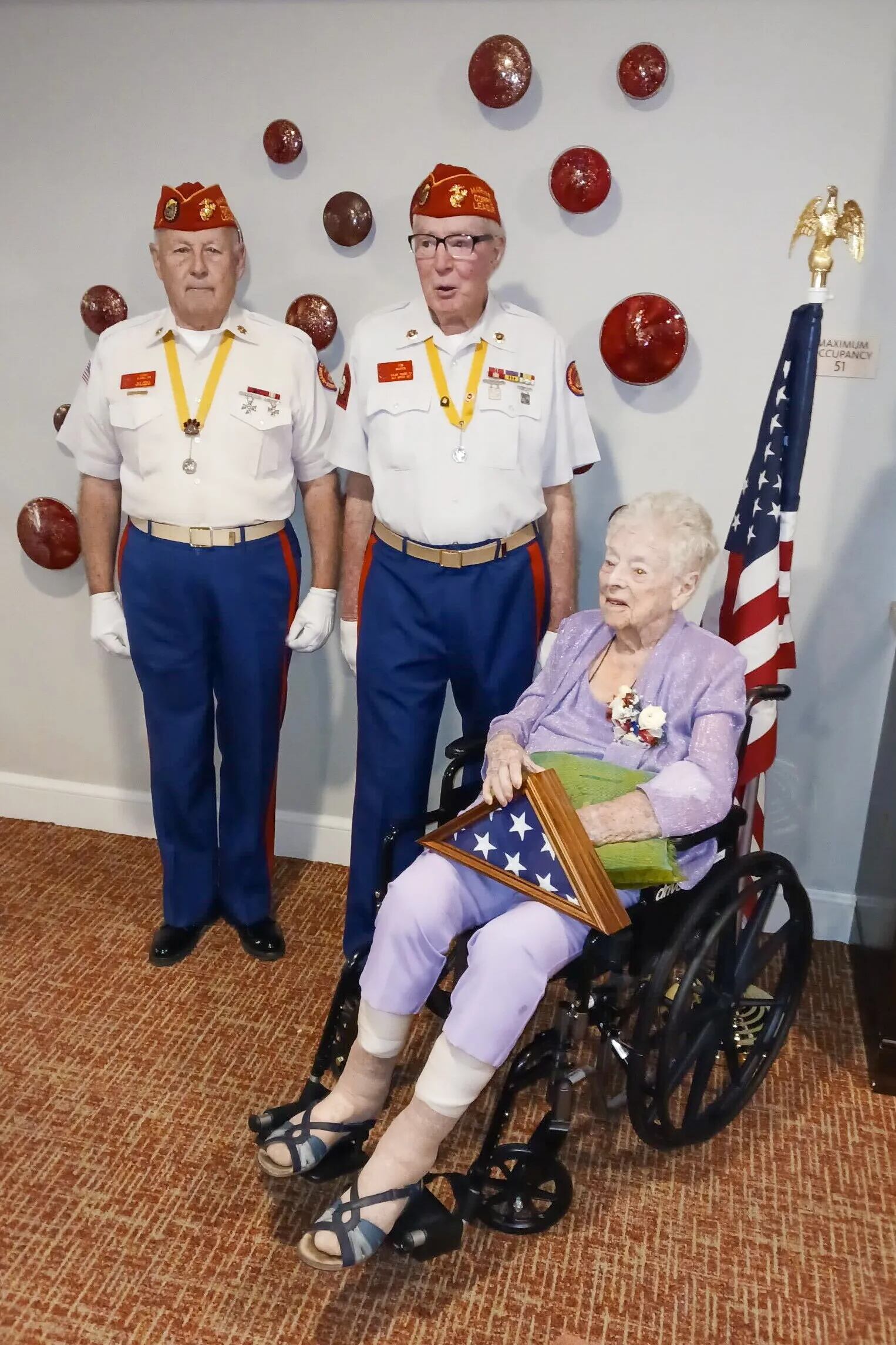 The mother of Cpl. David Ortals, who died in Vietnam, was presented with an American flag at her home in Arizona as ceremonies here honored her son. She turned 100 on Saturday.