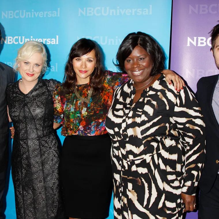 The cast of Parks and Recreation (from left) Nick Offerman, Amy Poehler, Rashida Jones, Retta Sirleaf, and Adam Scott, arrive for the NBCUniversal Press Tour Party in Pasadena, Calif., in 2012. Photo by Francis Specker