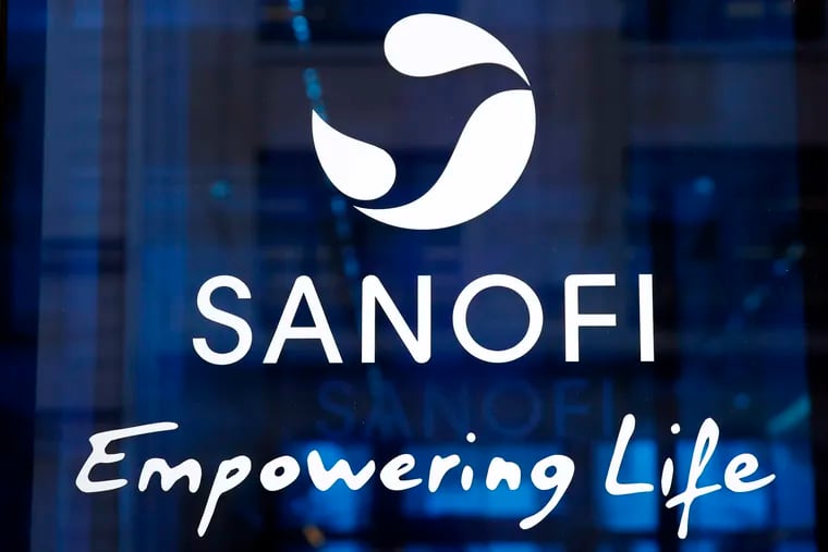 The logo of French drug maker Sanofi is pictured at the company's headquarters in Paris.