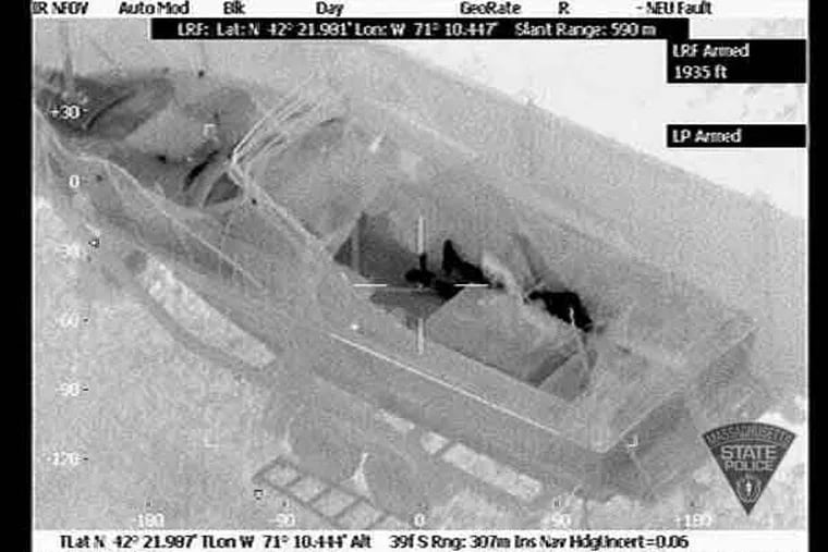 Infrared image released by the Massachusetts State Police Air Wing appears to show Boston Marathon bombing suspect Dzhokhar Tsarnaev on Friday, April 19, hiding in a Watertown, Mass., resident's boat in the resident's backyard.
