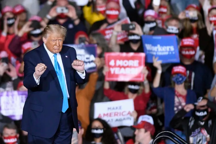 President Donald Trump dances during a campaign rally at Harrisburg International Airport, Saturday, Sept. 26, 2020, in Middletown, Pa. (AP Photo/Steve Ruark)