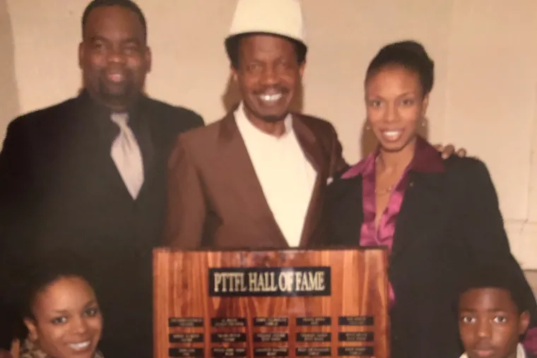 Mr. Stroman (center) celebrated with his family when he was inducted into the Philadelphia Two-hand Touch Football League hall of fame.