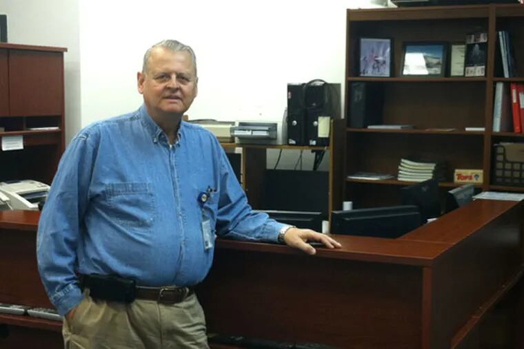 John Dougherty, coordinator of the Bucks County Emergency Management Agency, in the center he helped plan. He will retire Friday, Dec. 28, 2012. (Bill Reed/Staff) slug: