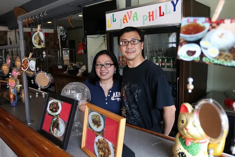 Debby and Ferry Takili, owners of Lil Java Indonesian Restaurant. ( DAVID MAIALETTI / Staff Photographer )