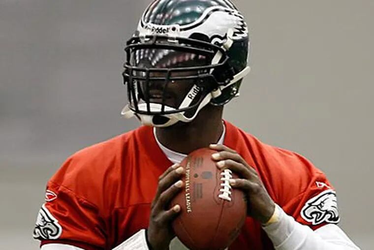 "Every time I step out on the field on game day, it's like Christmas to me." Eagles QB Michael Vick said. ( David Maialetti / staff photographer )