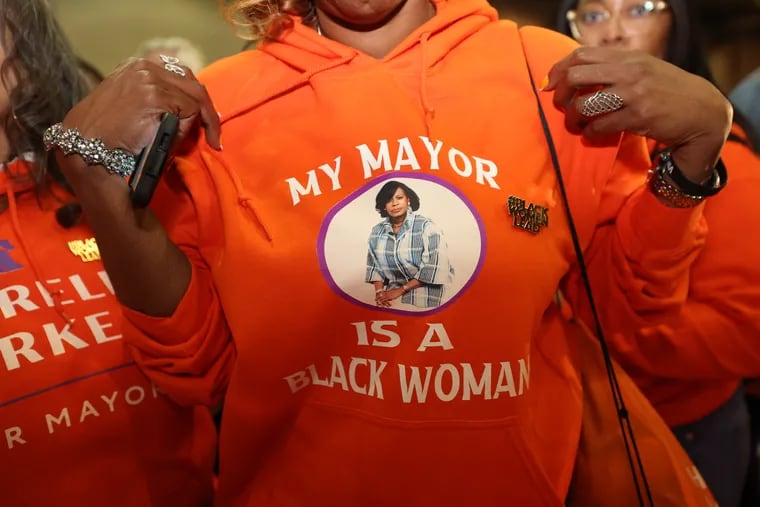 A woman shows off her hoodie reading “My Mayor is a Black Woman” at Cherelle Parker’s election night party at the Sheet Metal Workers Local 19 on Tuesday.
