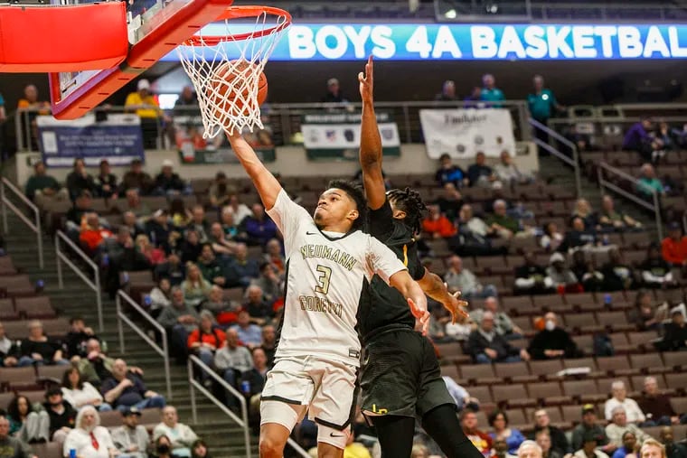 Khaafiq Myers of Neumann Goretti drives to the basket on March 23 at Giant Center in Hershey. Lincoln Park beat Neumann Goretti, 62-58, for the PIAA 4A boys’ basketball championship.