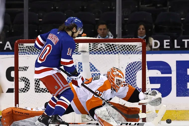 The New York Rangers' Artemi Panarin  is denied by Flyers goalie Brian Elliott in the first period. The Flyers allowed the first goal for the 14th time in the last 16 games.