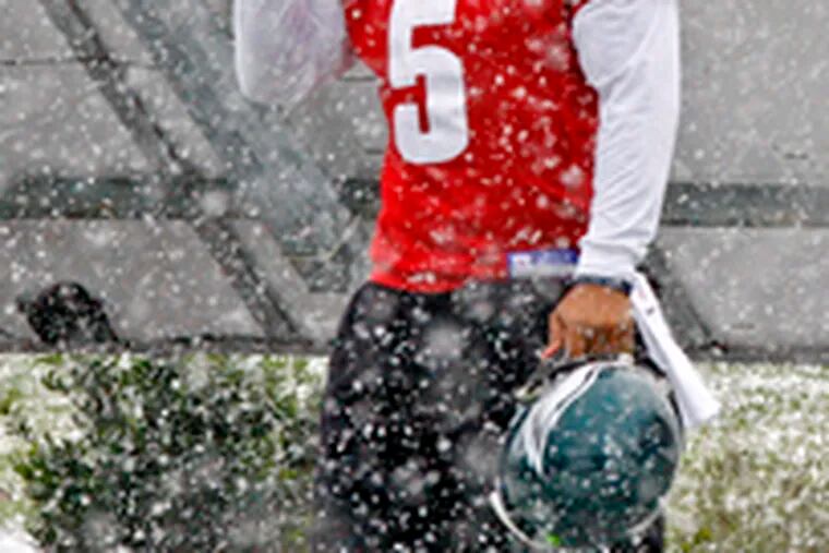Donovan McNabb walks through the snow to get to indoor practice. He is expected to play against the Giants on Sunday. If things don&#0039;t go well, something nastier than snow might be raining down on him at the Linc.