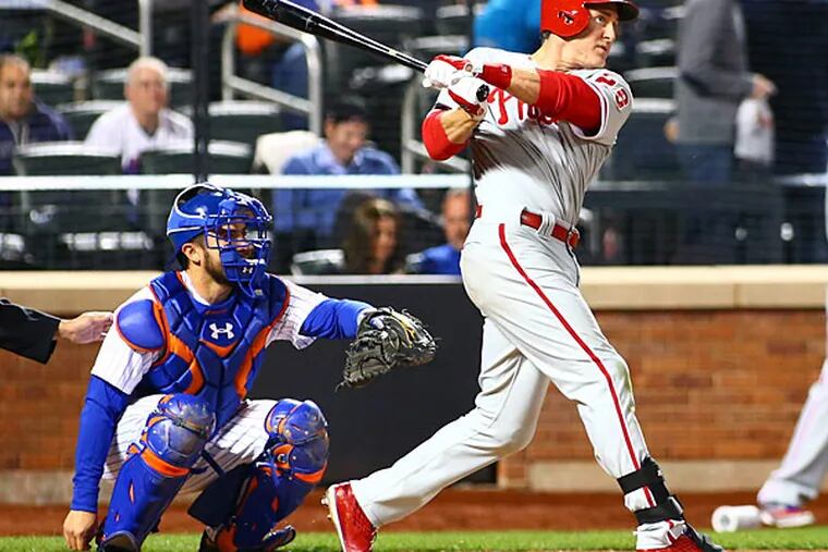 Philadelphia Phillies second baseman Chase Utley (26) hits a solo home run in the eighth inning against the New York Mets at Citi Field. (Andy Marlin/USA Today)