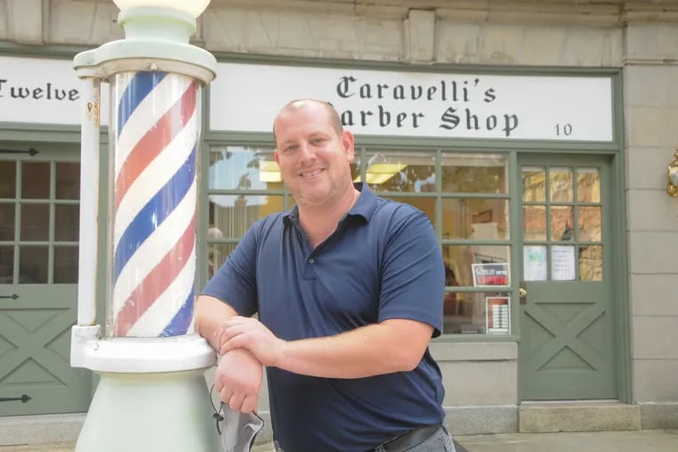Barber Anthony Fiore, owner of Caravelli's  Barber Shop on Kings Hwy. in Haddonfield.   CURT HUDSON  / For the Inquirer