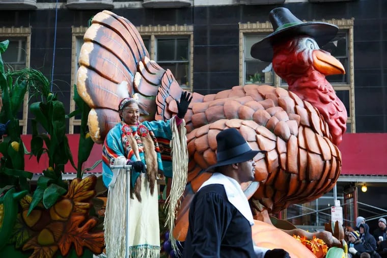 Parade participates wave from the first float of the 98th Annual Philadelphia Thanksgiving Day Parade, on Thursday, Nov. 23, 2017. JESSICA GRIFFIN / Staff Photographer