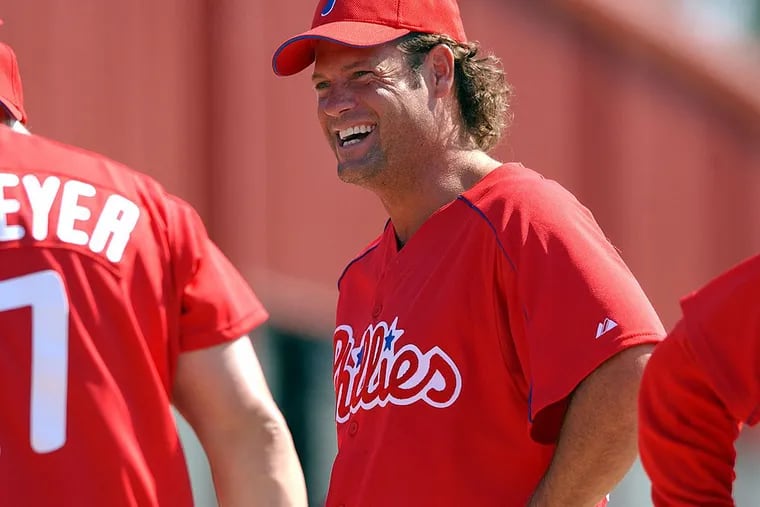 Darren Daulton speaking to other coaches during spring training practice in Clearwater, FL., February 22, 2004.