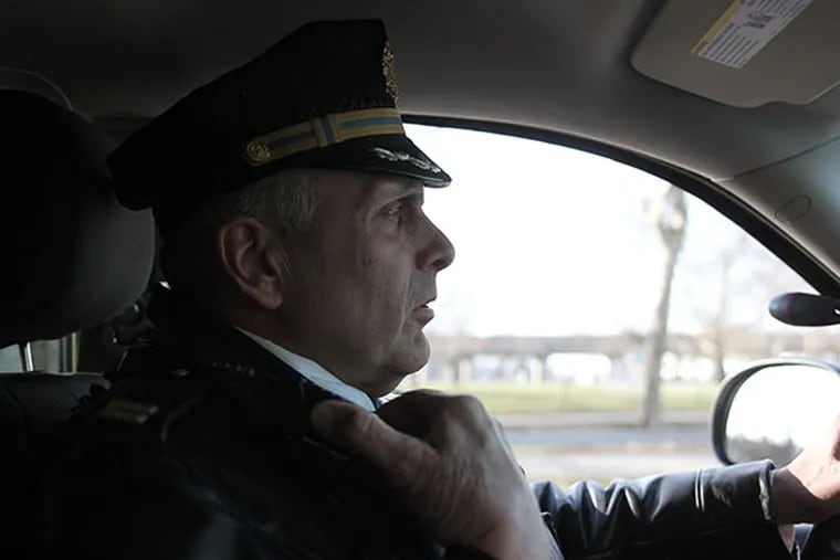 First Police District Captain Lou Campione patrols the streets of South Philadelphia on Thursday, December 26, 2013.  ( Yong Kim / Staff Photographer )
