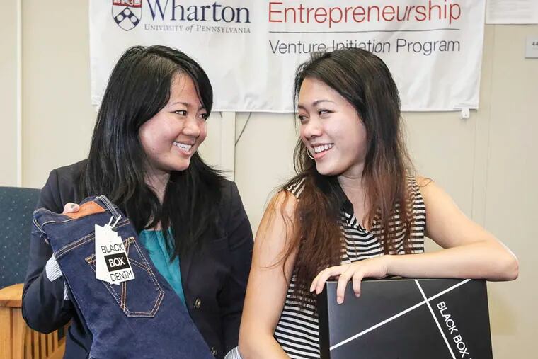 TALKING SMALL BIZ with Adina Luo , left and Molly Liu, two Wharton School undergrads who are launching a jeans brand for the masses called Black Box Denim. Thursday, September 4, 2014. Washington beat O'Hara 15-6.  (  Steven M. Falk / Staff Photographer )