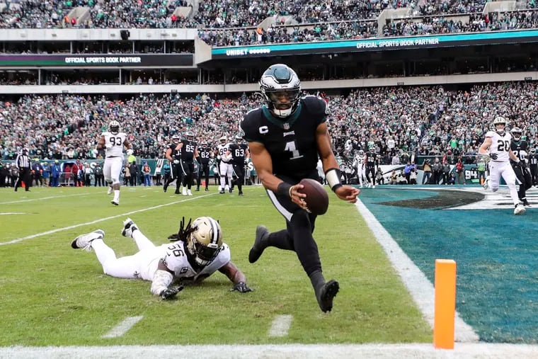 Philadelphia Eagles quarterback Jalen Hurts (1) scores his second rushing touchdown in the first quarter of the Philadelphia Eagles game against the New Orleans Saints at Lincoln Financial Field in Philadelphia on Sunday, Nov. 21, 2021.