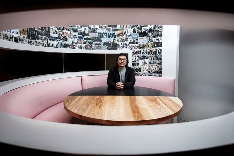 Chef Peter Serpico in one of the three dining pods at Kpod restaurant, 3636 Sansom St. The color-changing pods have been reupholstered and now sport photos.