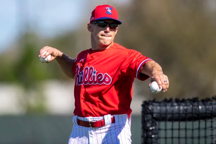 Phillies Joe Girardi pitches during a spring training batting practice in Clearwater, Fla., in February.