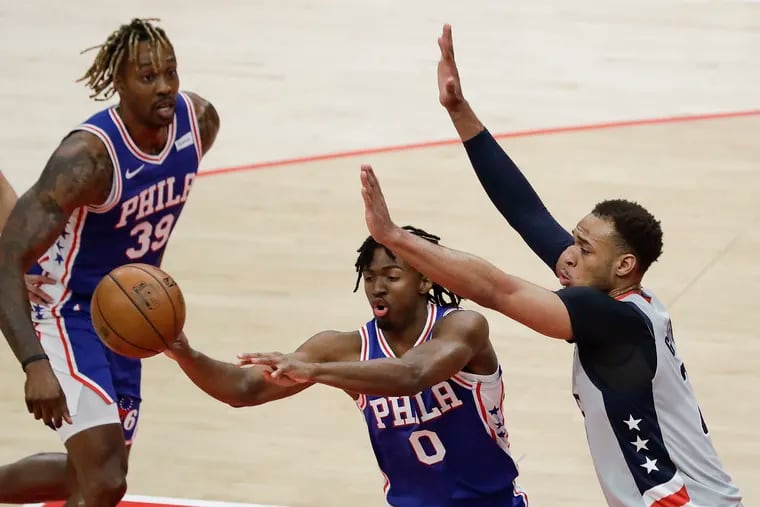 Sixers guard Tyrese Maxey passes the basketball during Game 3 against the Wizards.