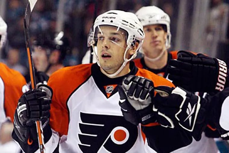 "We found a way to steal one, basically,'' Danny Briere said about Wednesday's win. (AP Photo/George Nikitin)
