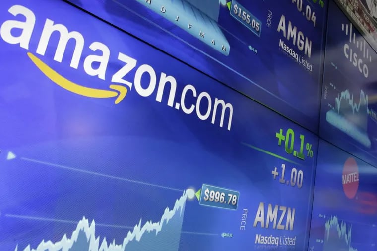 The Amazon logo is displayed at the Nasdaq MarketSite, in New York's Times Square, Tuesday, May 30, 2017. Online retail giant Amazon.com traded above $1,000 a share for the first time.