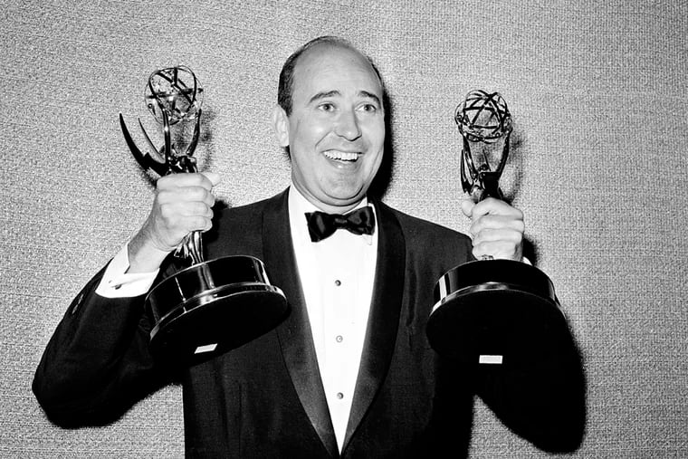 In this 1963 photo, Carl Reiner shows holds two Emmy statuettes presented to him as best comedy writer for the "Dick Van Dyke Show."
