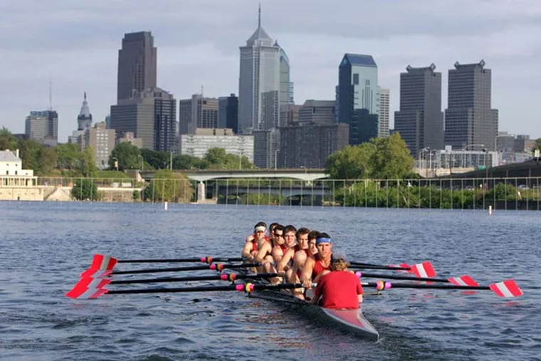 The varsity eight crew from Saint Joseph's University works out on the Schuylkill in preparation for the Dad Vail Regatta  (Barbara L. Johnston/Inquirer)