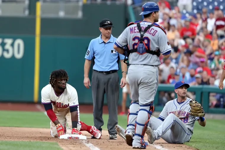 Phillies' outfielder Odubel Herrera gets thrown out at first base on a baserunning gaffe that cost the Phillies on Saturday against the Mets.